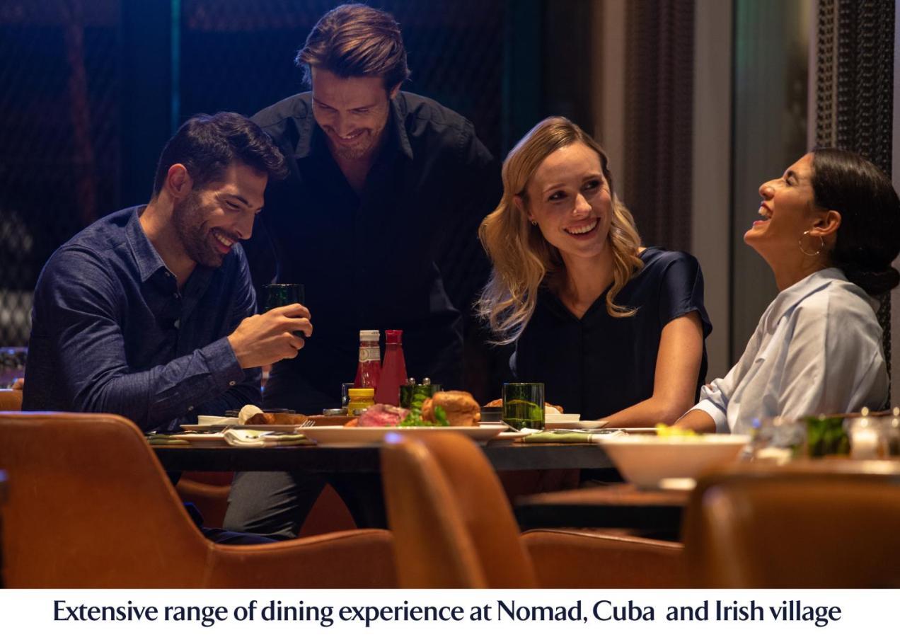 Jumeirah Creekside Dubai Esterno foto Dining at Nomad