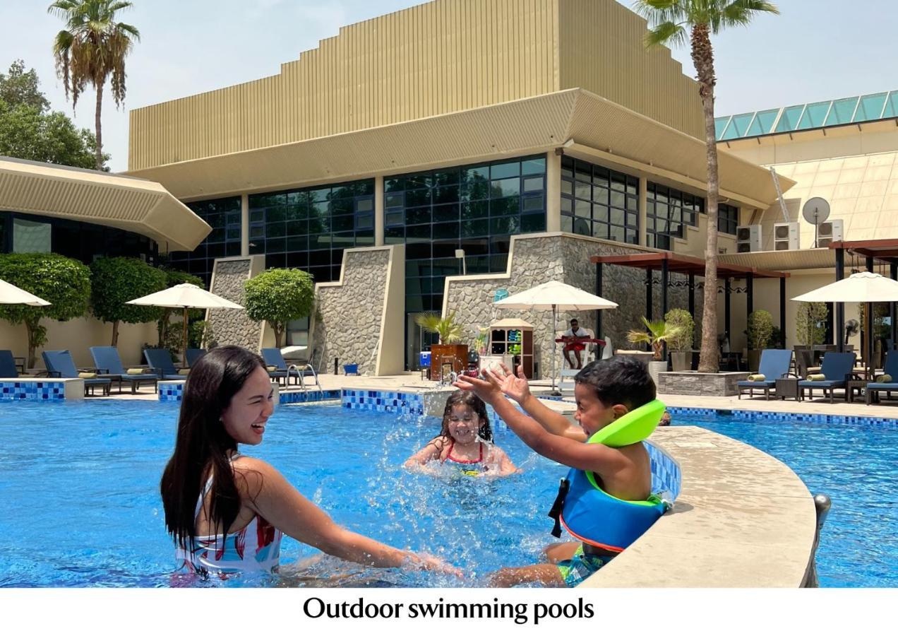 Jumeirah Creekside Dubai Esterno foto Outdoor Swimming Pools